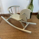 Vintage wooden rocking horse in its patina