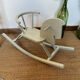 Vintage wooden rocking horse in its patina