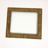 Vintage gilded frame decorated with stylized flowers