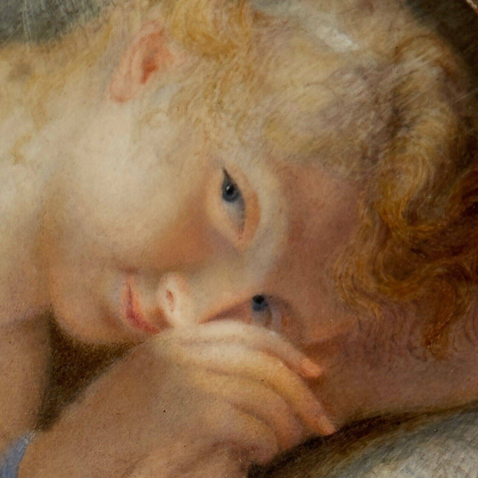 19th century miniature of a young girl with her head resting on a cushion