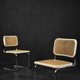 Set of 2 modern vintage Italian chairs in white wood and mid-century French wicker.