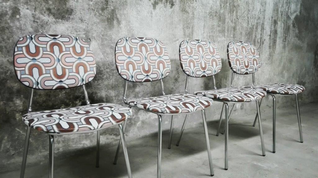 Series of four vintage italian chairs in chrome steel