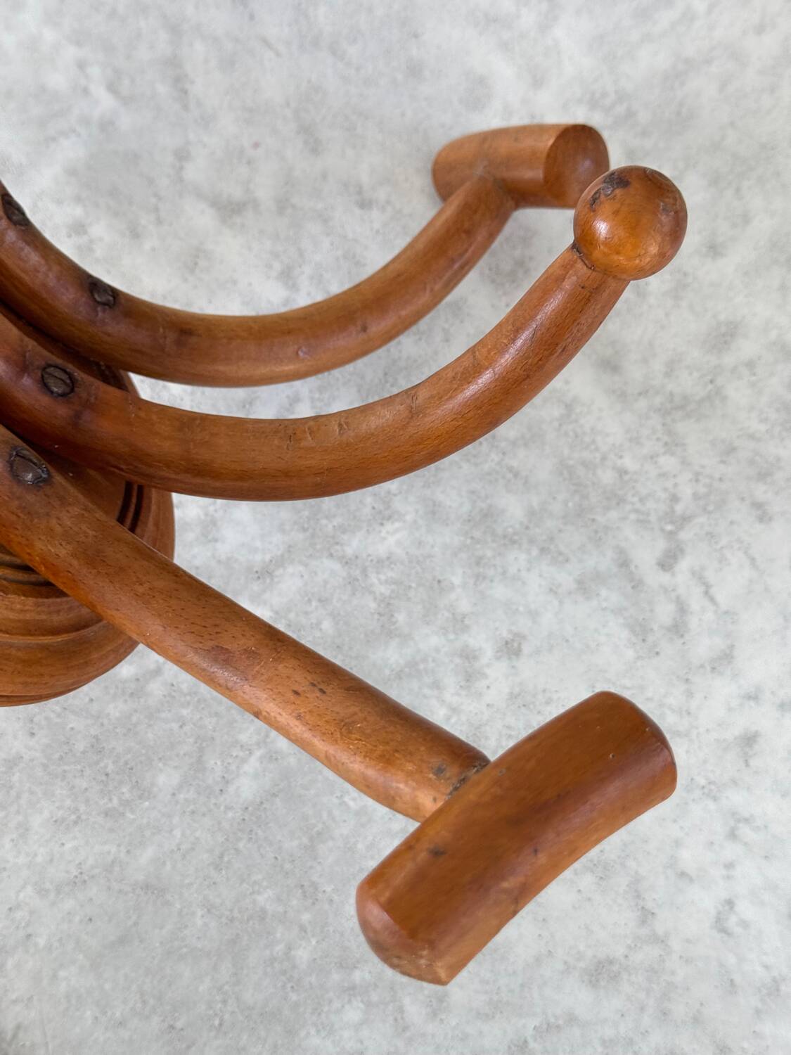 Pair of curved wooden coat racks or hooks from the 1900s