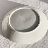 Yellow porcelain plate with saturated and vivid colors. Handmade in Japan