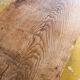 Old coffee table in solid oak wood. France, early twentieth century.