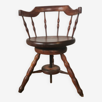 Swivel office chair called captain's chair circa 1900