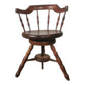 Swivel office chair known as a captain's chair, circa 1900