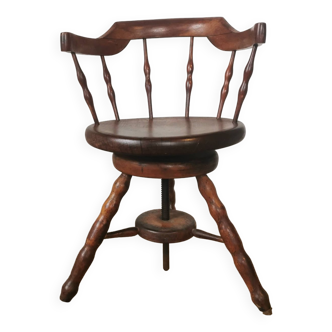 Swivel office chair called captain's chair circa 1900