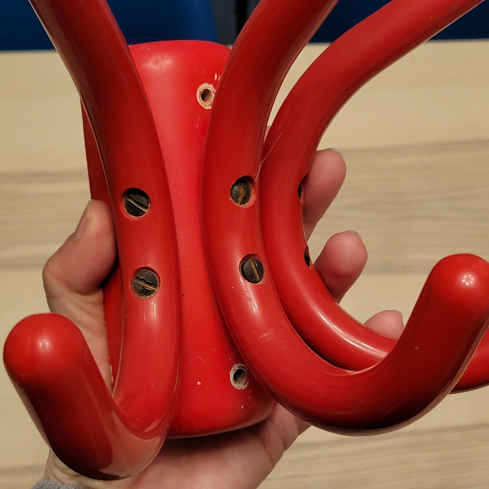 Red parrot wall coat rack