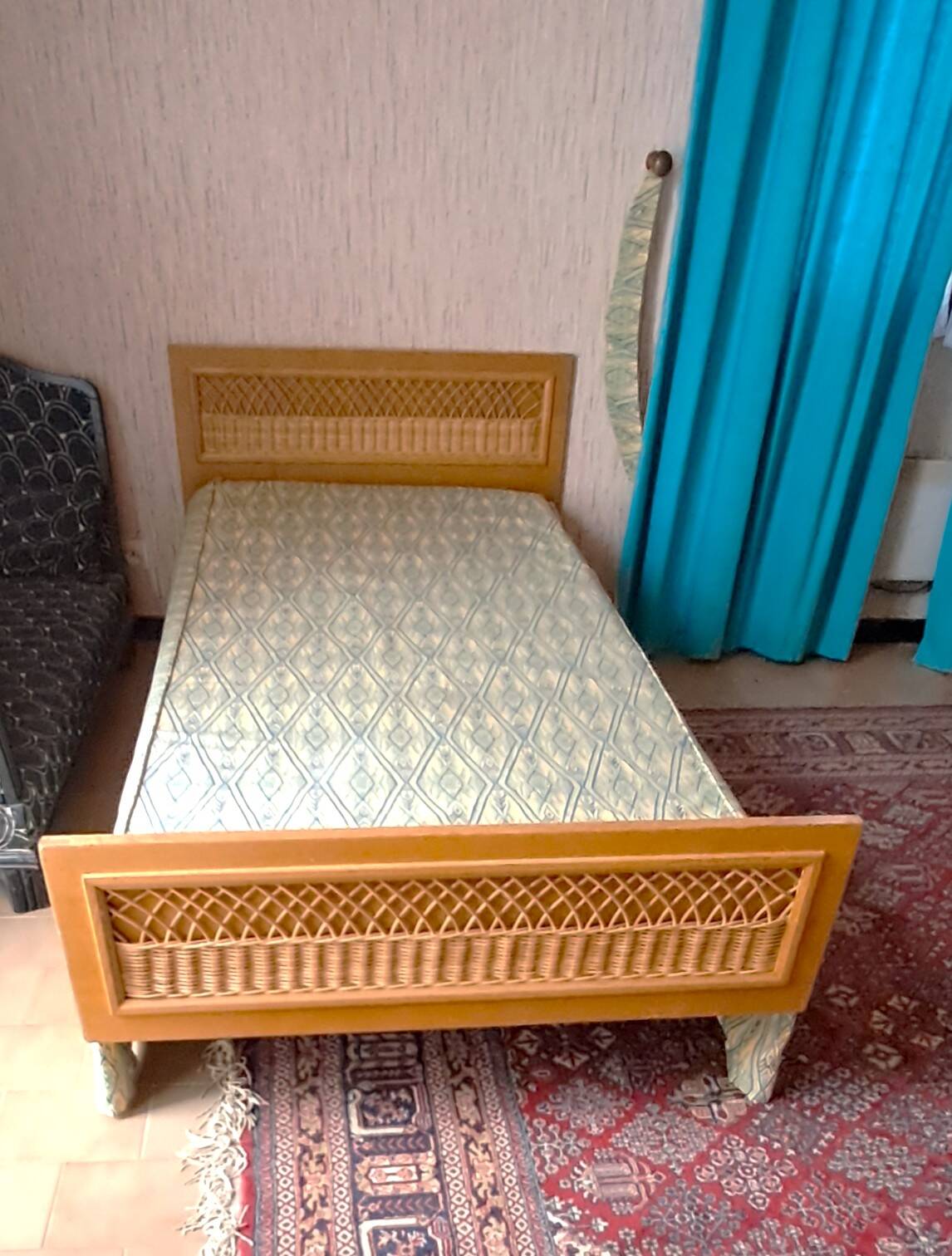 Vintage 1970s single rattan bed in blond wood