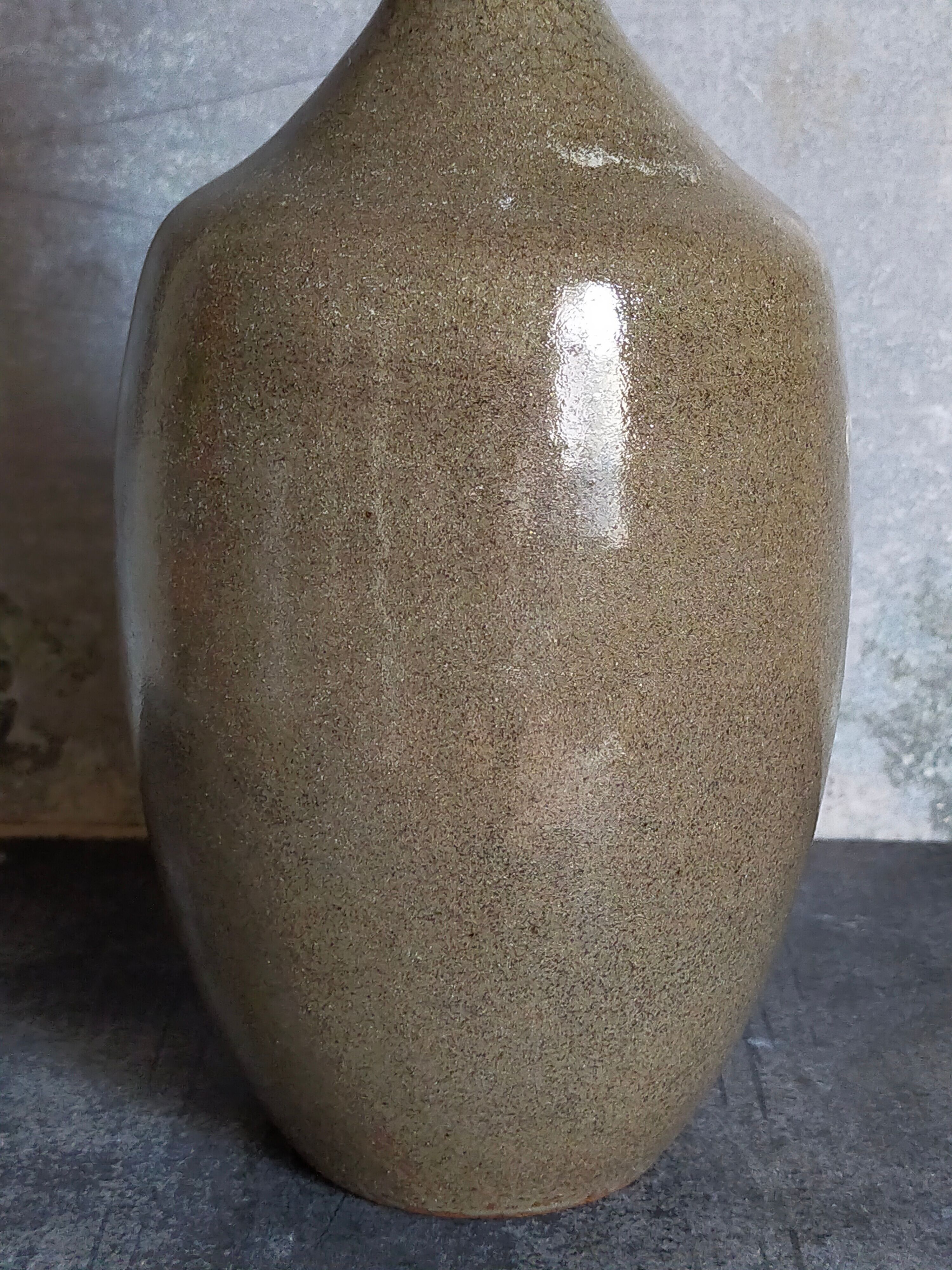 Vintage glazed stoneware potter's liquor bottle