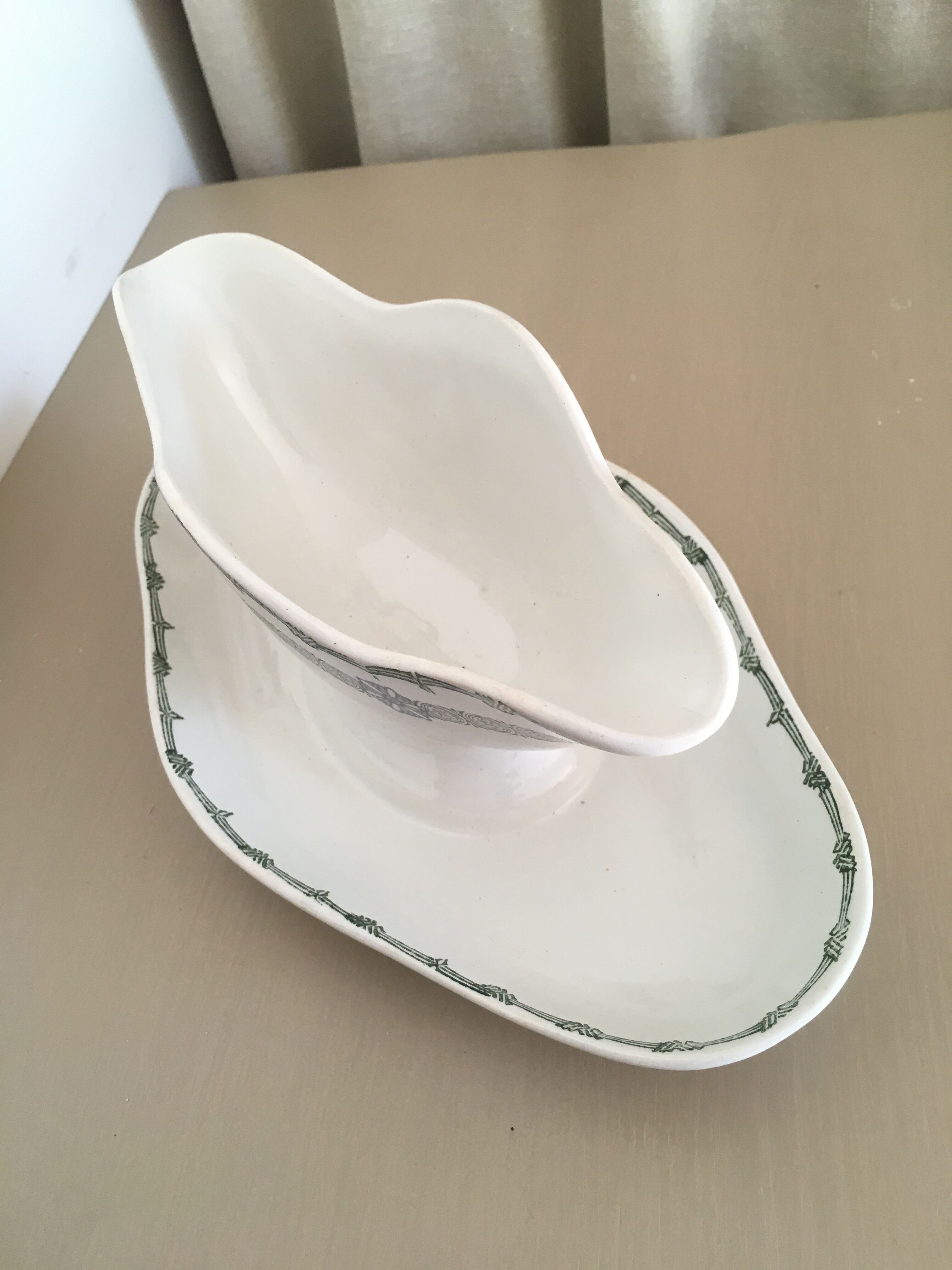 Ancient earthenware saucière