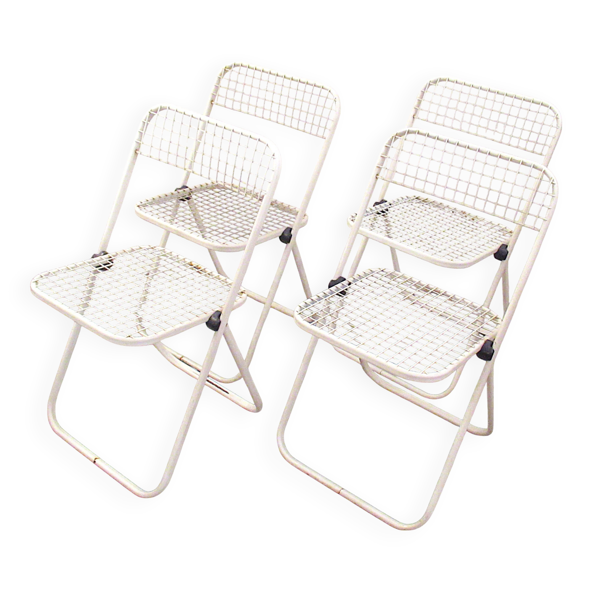Four Talin Spa metal mesh chairs from the 1980s.