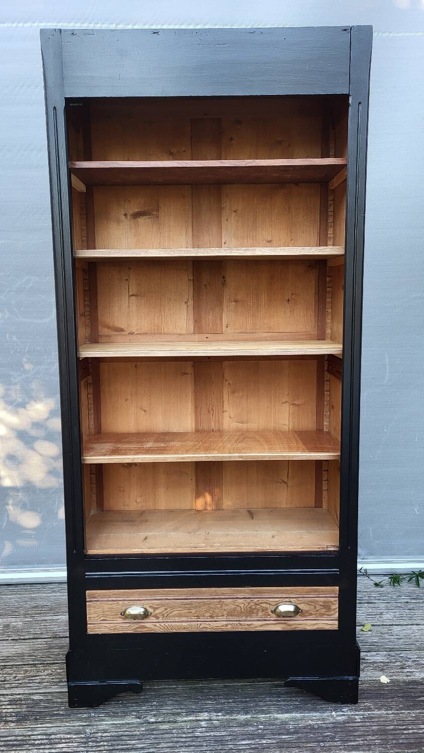 Two-tone black and honey bookcase