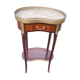Louis XVI period pedestal table, in solid mahogany and veneer, and in gilded bronze.