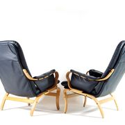 Pair of vintage leather lounge armchairs 70s