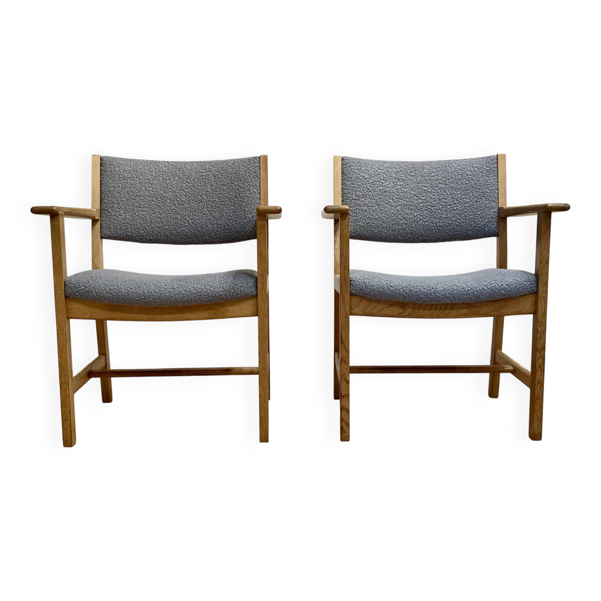 A pair of armchairs stamped "hans wegner" 1960.