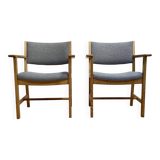 A pair of armchairs stamped "hans wegner" 1960.
