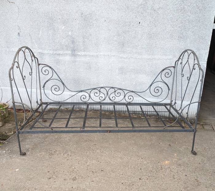 Metal folding bed, wrought iron bench