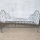 Metal folding bed, wrought iron bench