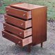 Vintage golden oak chest of drawers with 4 spindle feet from the 1950s