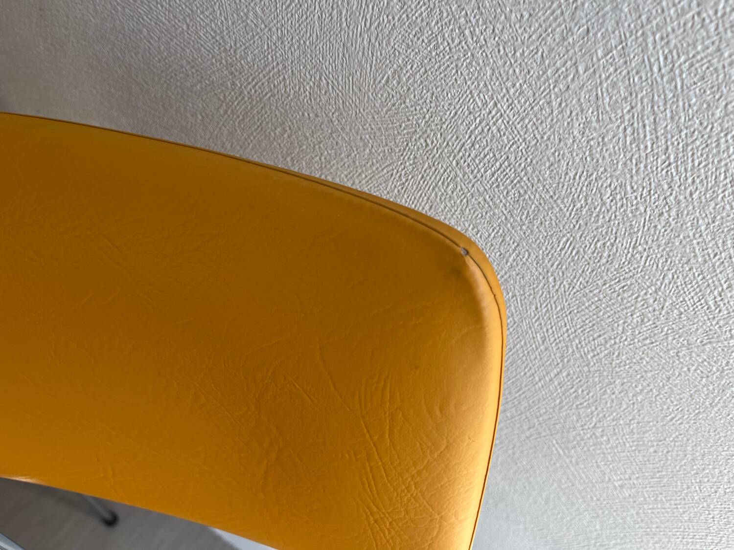 LM vintage chrome and orange/mustard yellow faux leather chairs