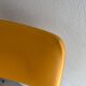 LM vintage chrome and orange/mustard yellow faux leather chairs