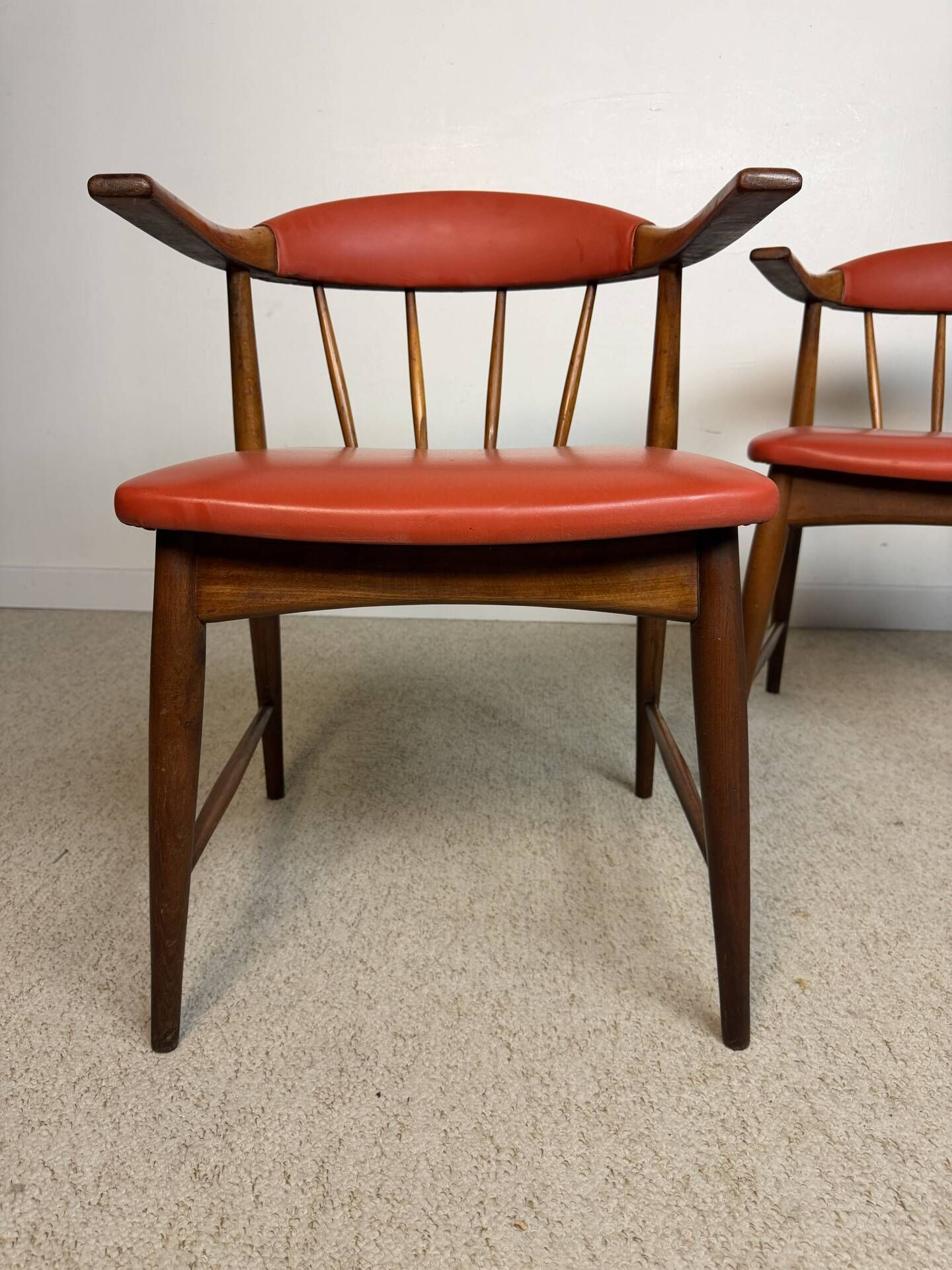 Pair of Scandinavian armchairs in teak and red faux leather – 1960s