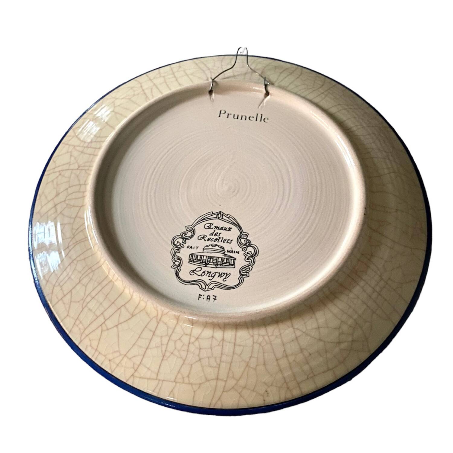 Ceramic plate with Longwy enamels