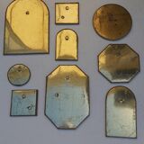 Set of 9 oriental brass mirrors