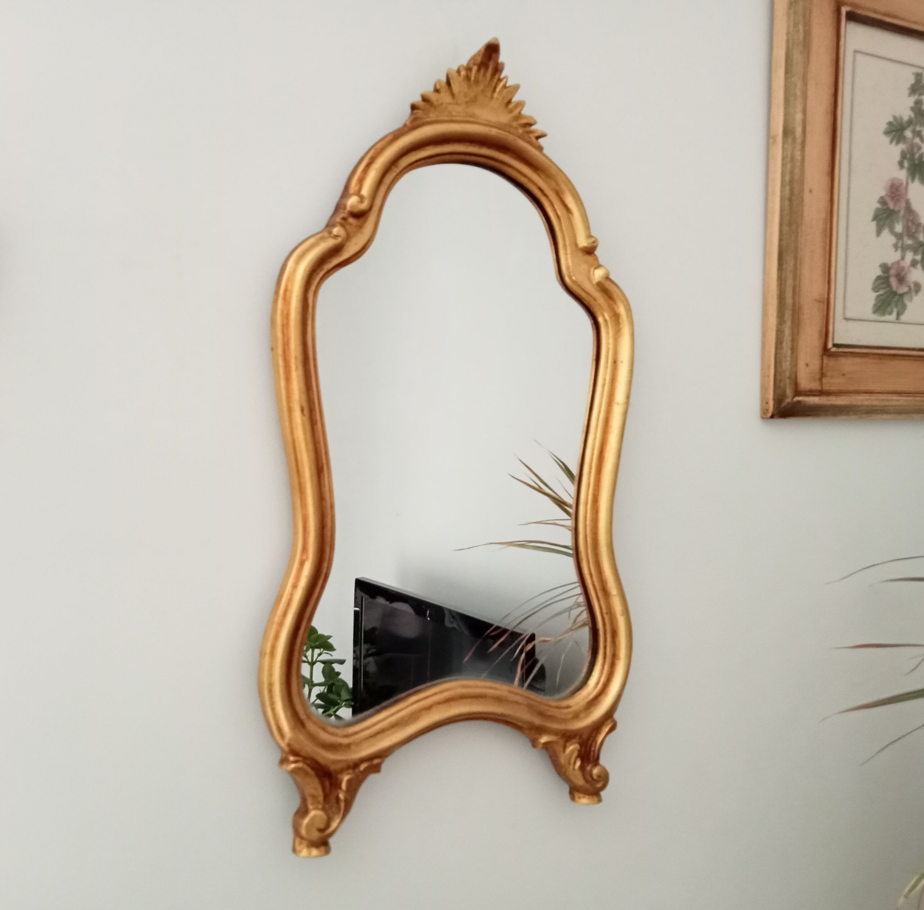 Vintage rocaille mirror in gilded wood