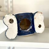 Blue and red ceramic elephant plant stand