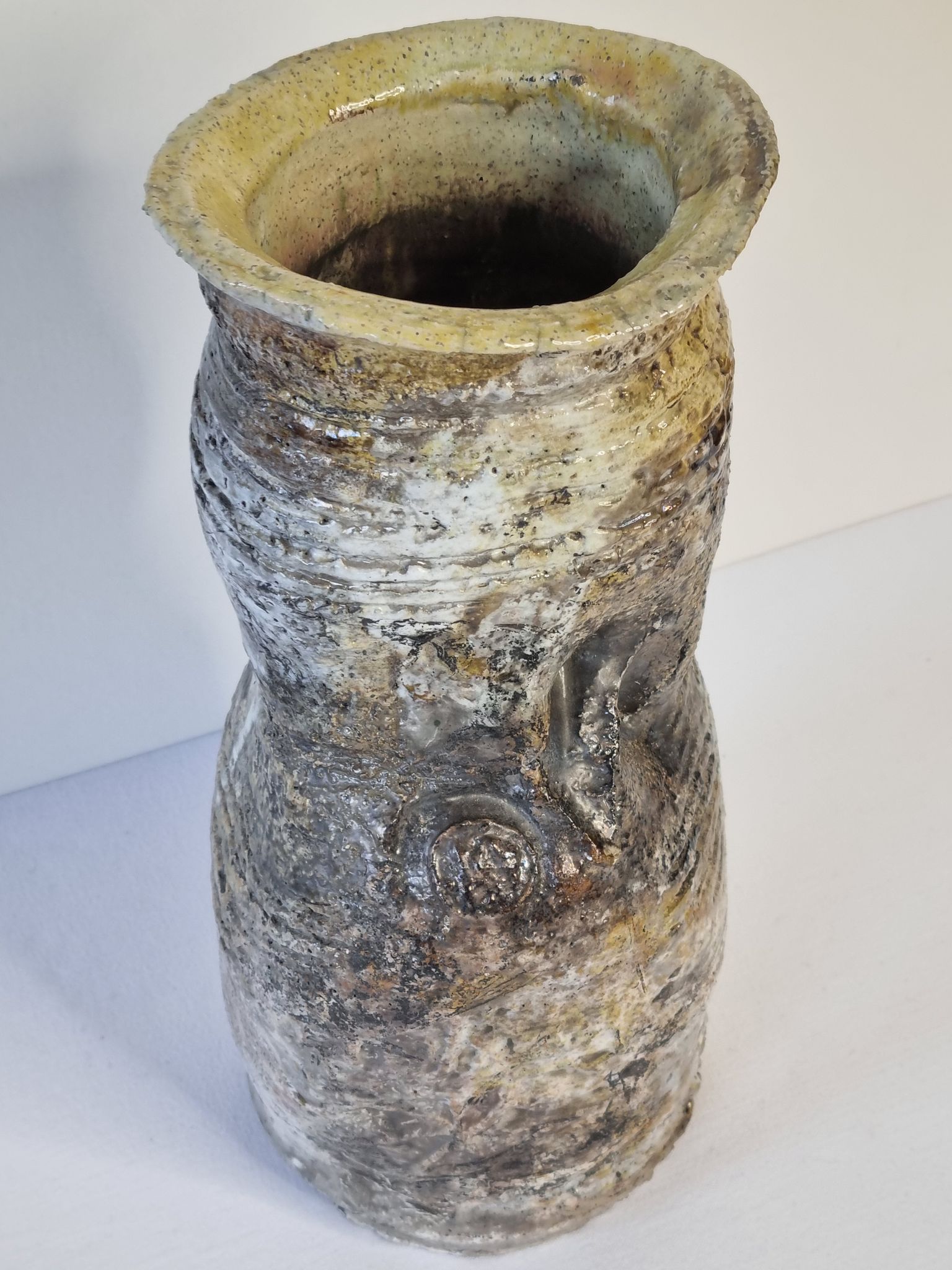 Enamelled ceramic roll vase