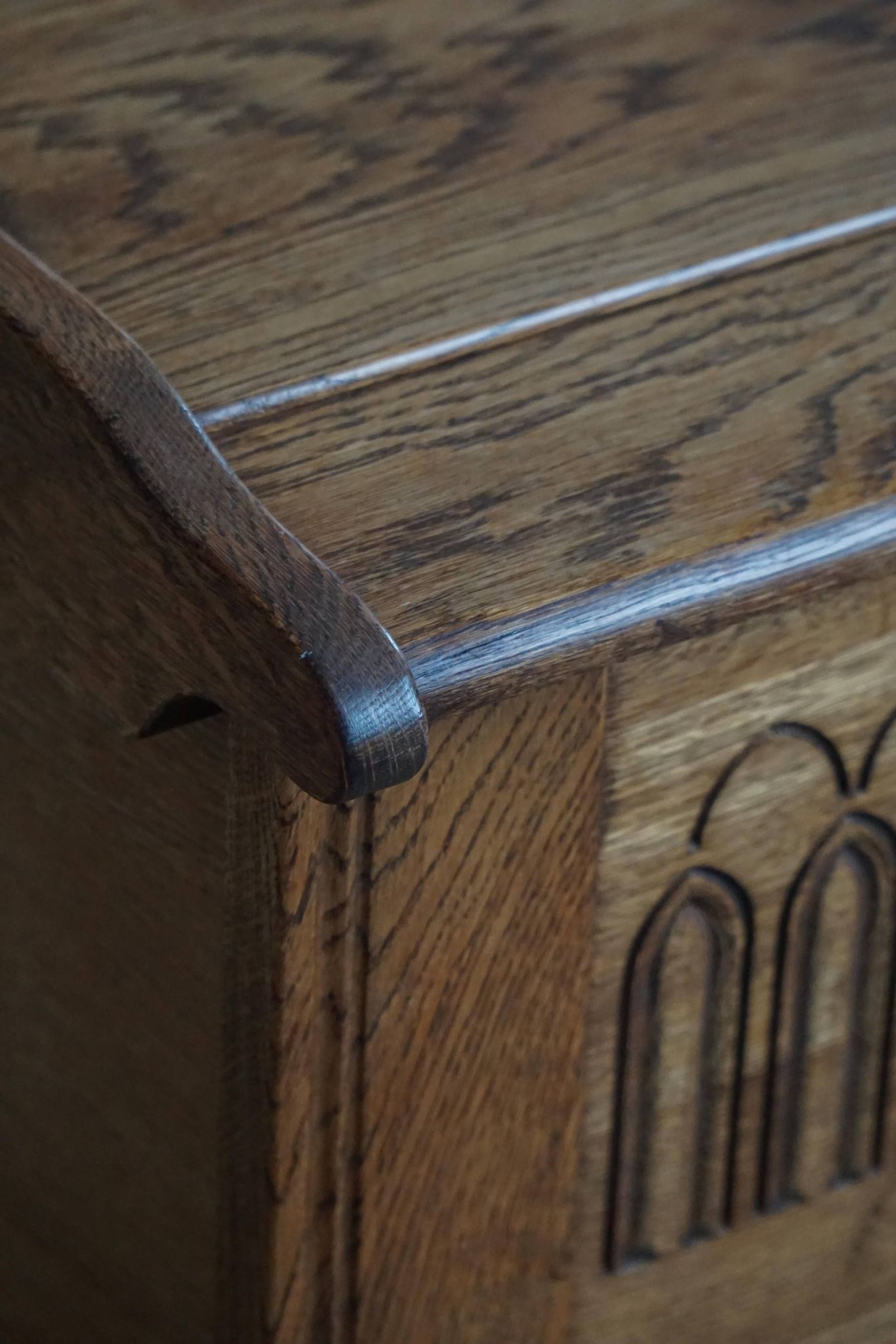 Modern Danish oak commode with decorative relief sculpture, mid-20th century.