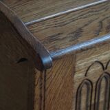 Modern Danish oak commode with decorative relief sculpture, mid-20th century.