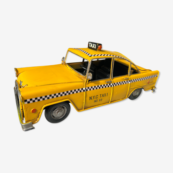 Taxi jaune New-Yorkais vintage en métal