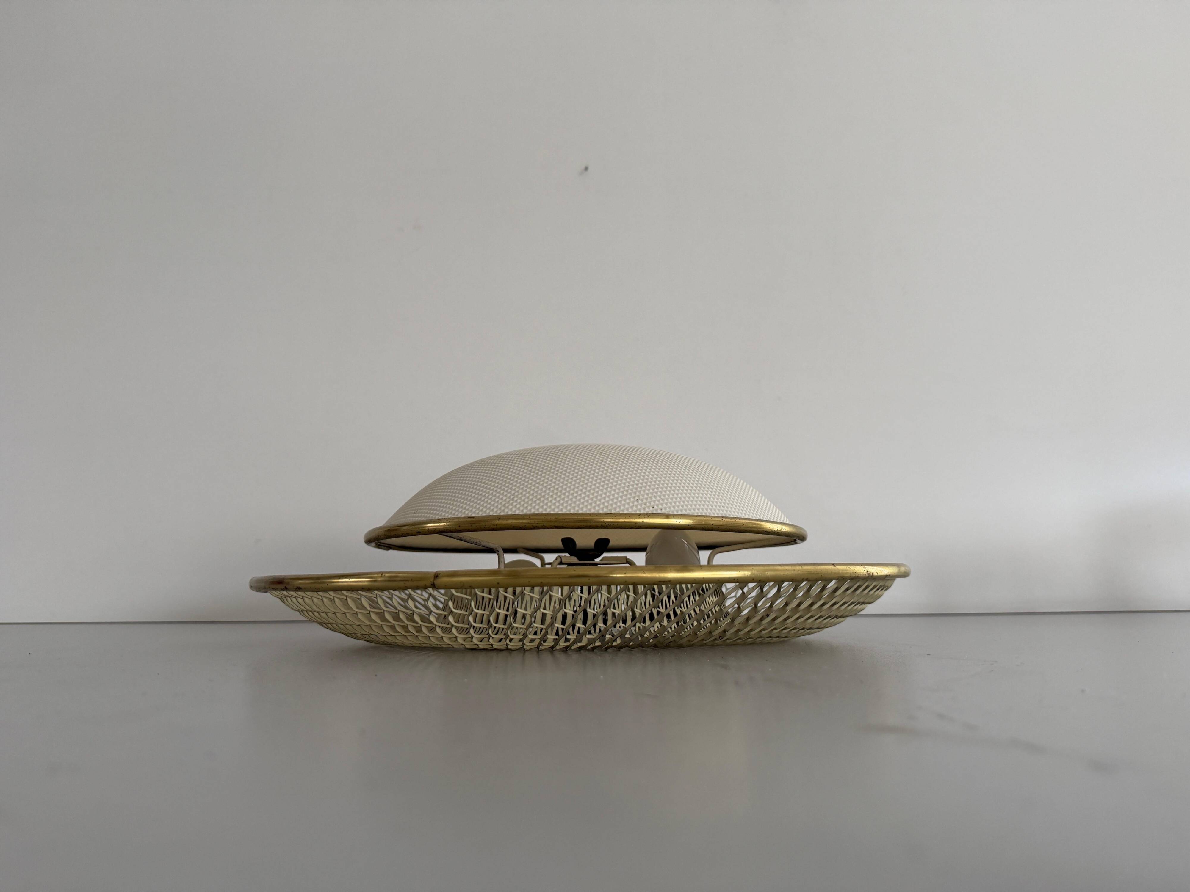 Mid-century golden metal wire and plastic ceiling light by Erco, 1950s, Germany.