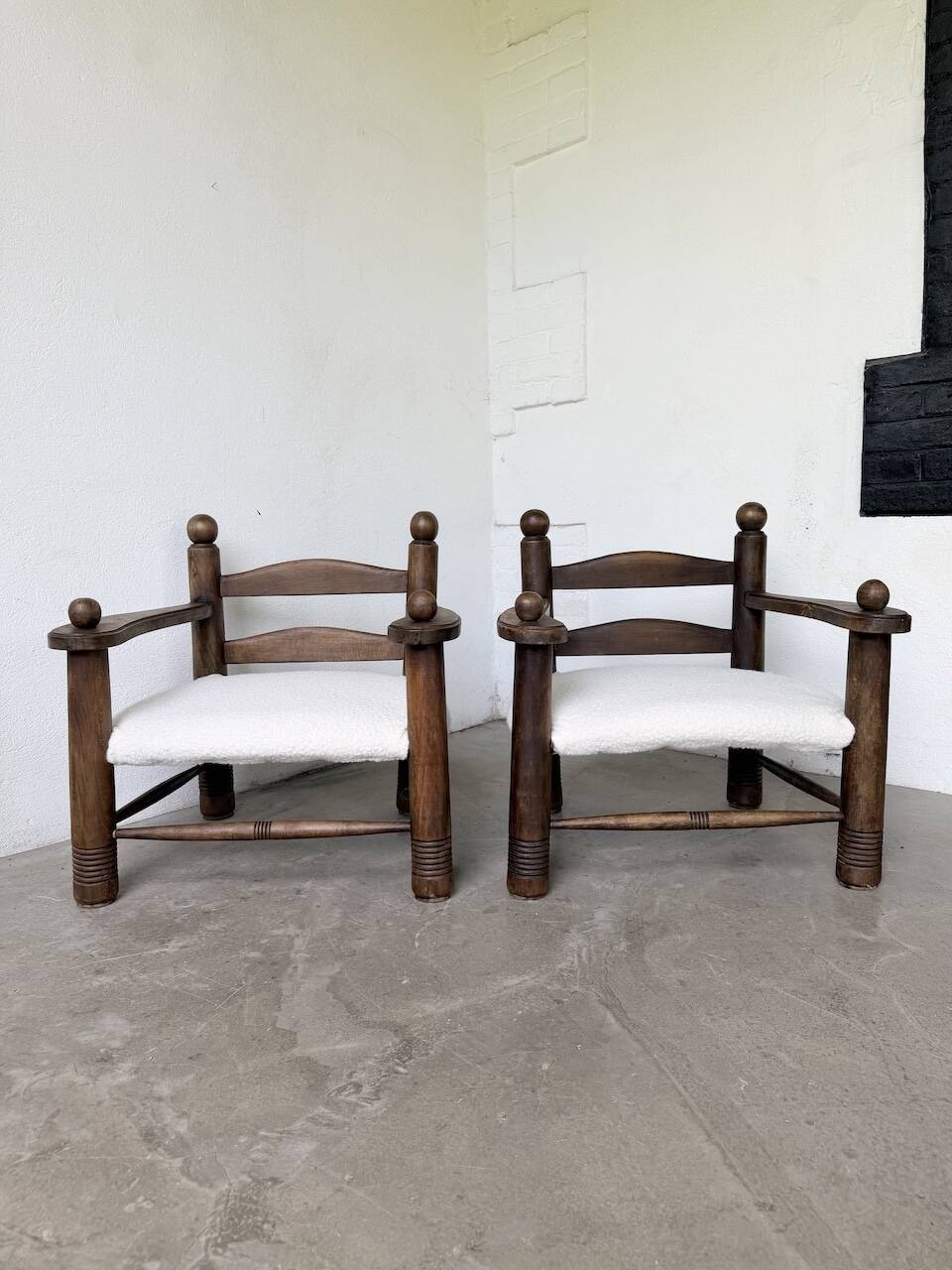 Pair of Dudouyt armchairs from the 1950s, oak.