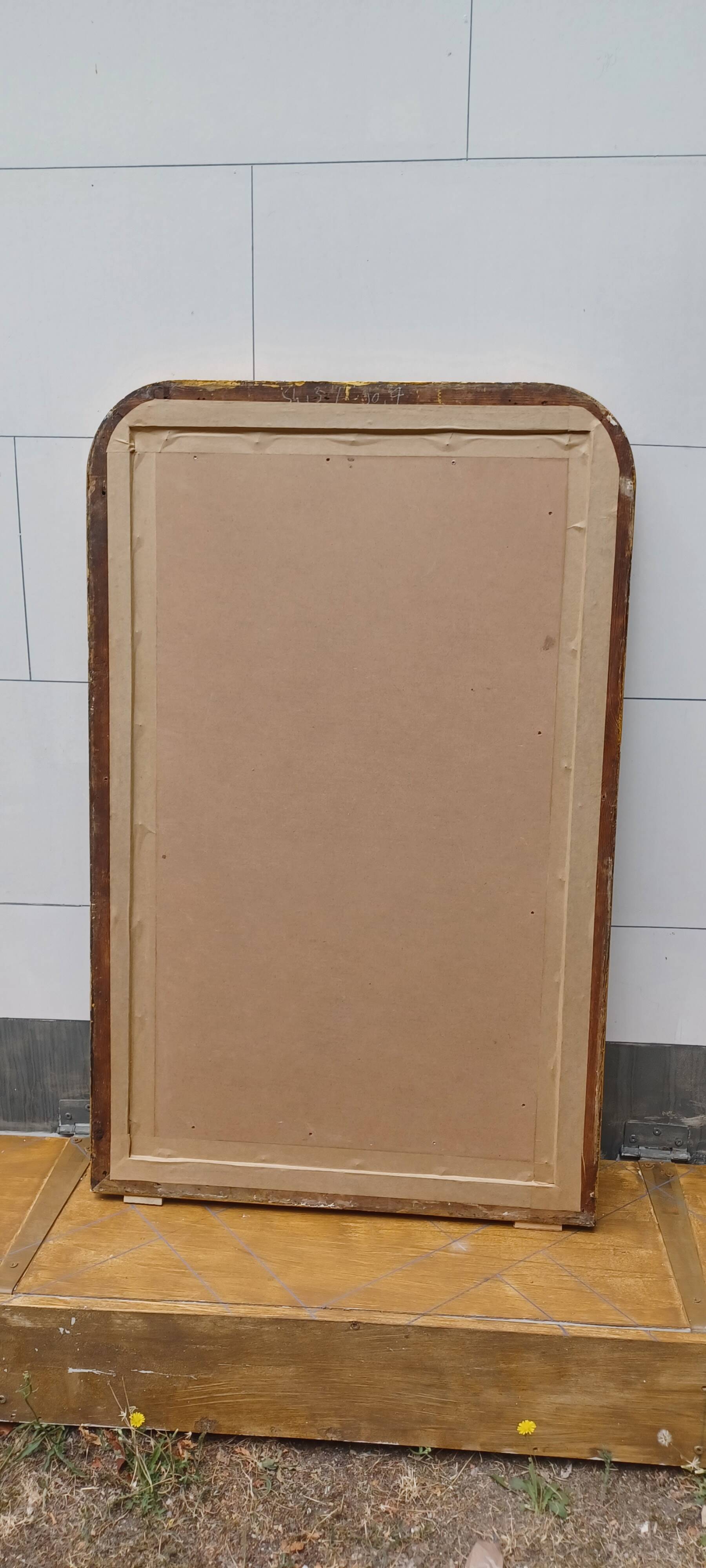 Antique louis-philippe gilt wood mirror from the 19th century. 102 cm x 65 cm