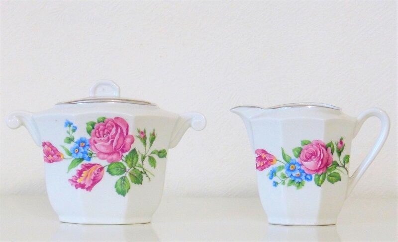Ancient milk pot and sugar bowl in earthenware decorated with ancient roses