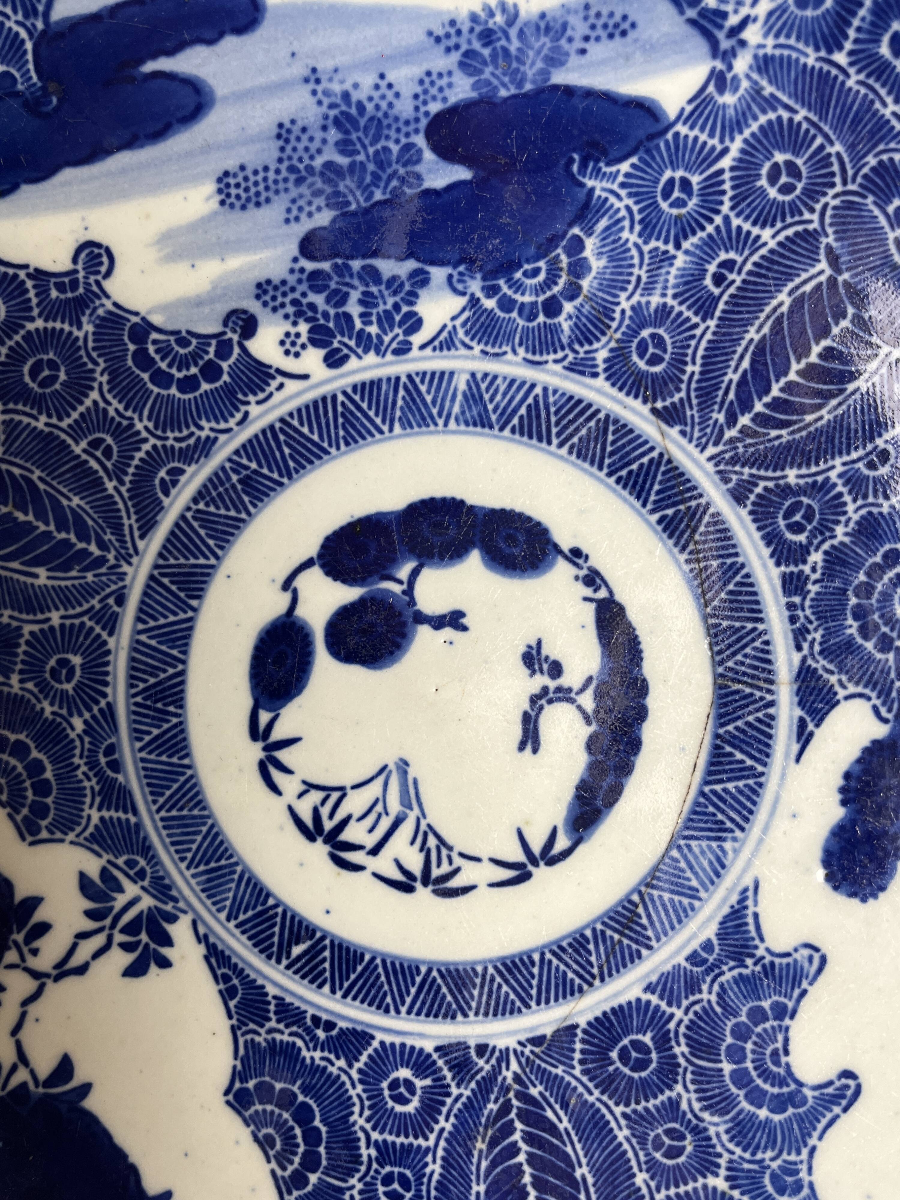 Japan, large white and blue porcelain plate from the 19th century.