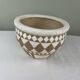Cache pot vintage graphique