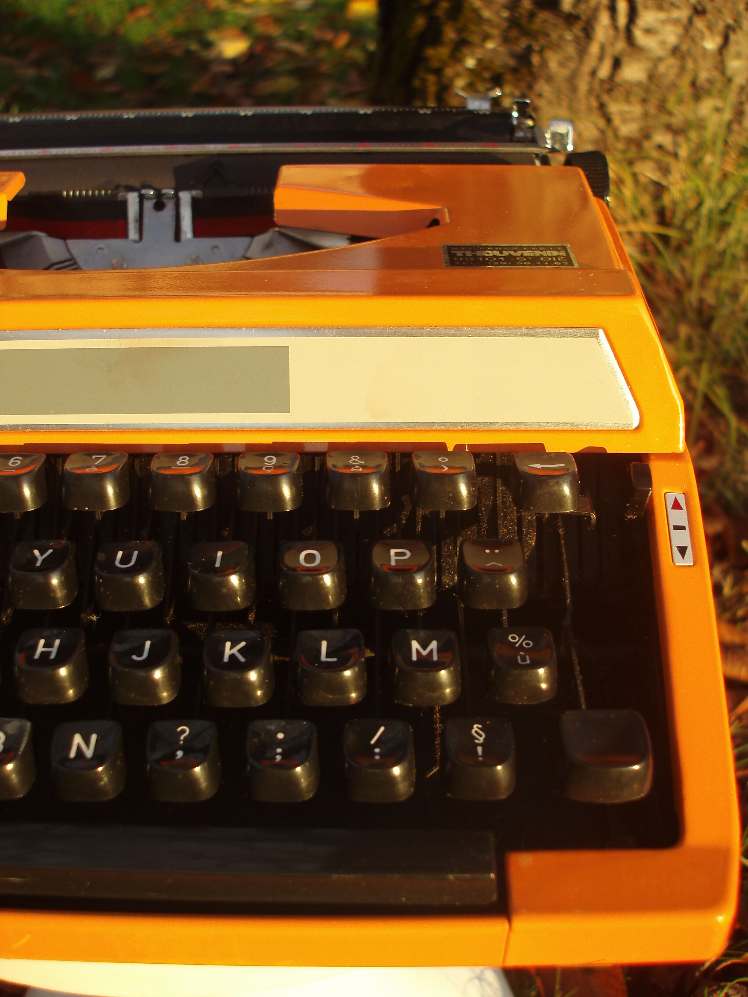 Silver reed orange and black typewriter with bag