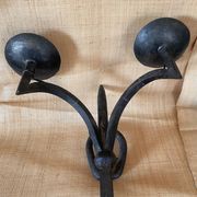 Wrought iron wall lights.