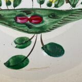 Old plate with flower and rooster pattern