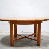 Vintage extendable round wooden dining table