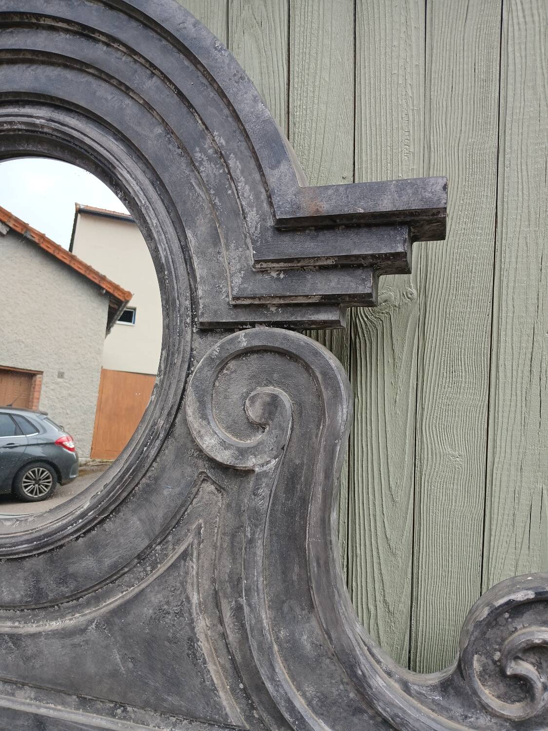 Wooden bull's-eye mirror
