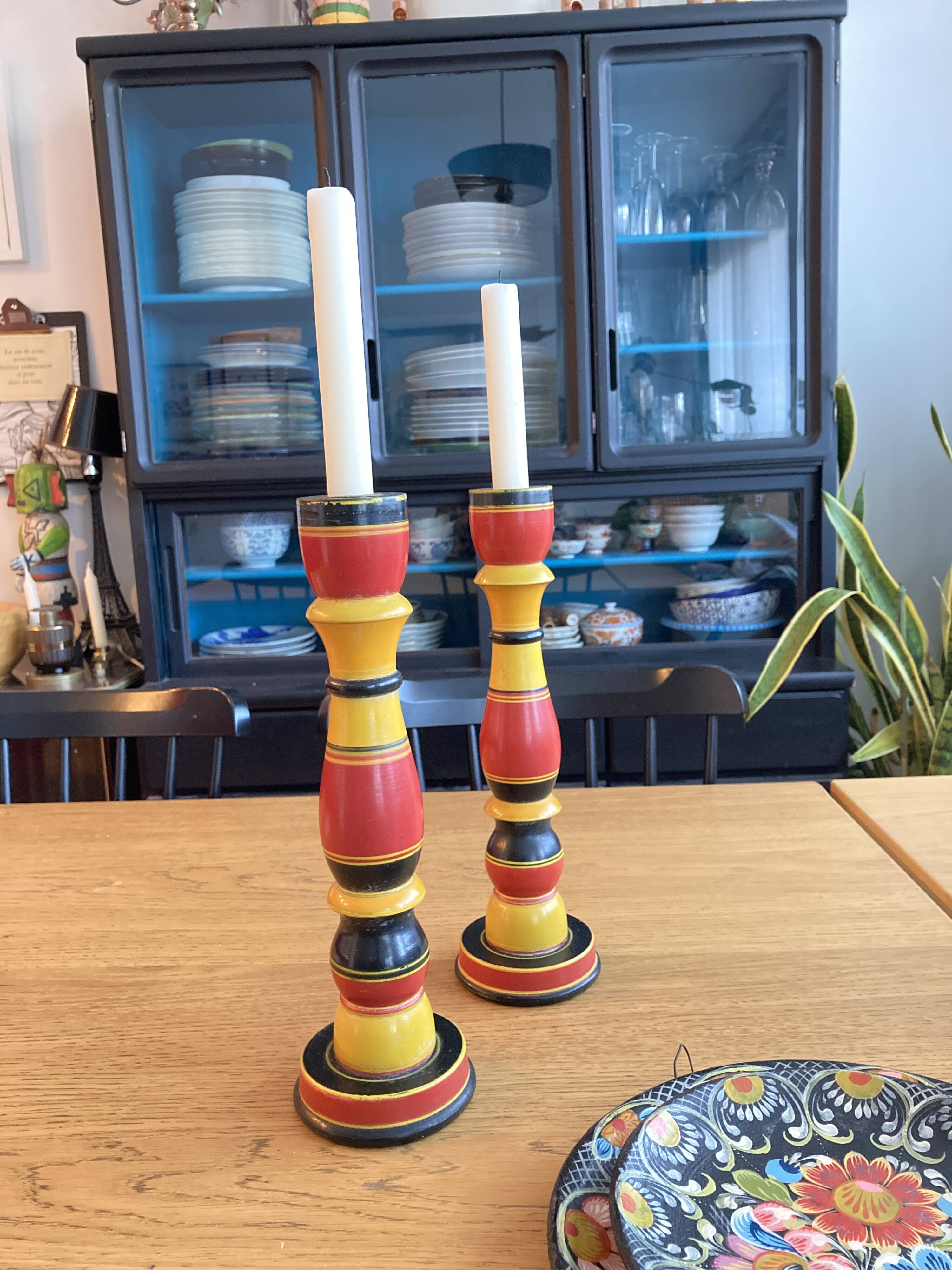 Polychrome turned wooden candlesticks