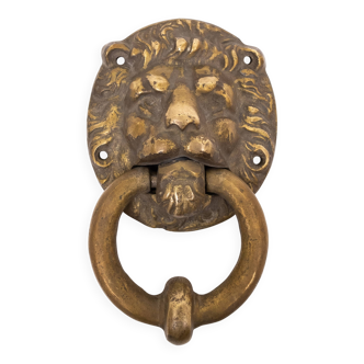 Heurtoir de porte en bronze doré à tête de lion. Hollande du début du XXe siècle.
