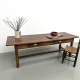 Authentic French farmhouse table from 1890 in solid oak with two drawers.
